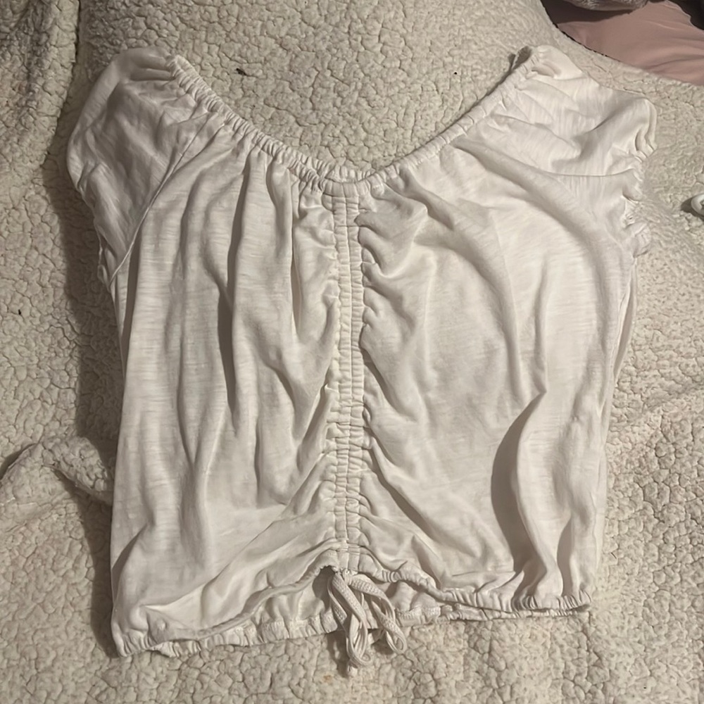 white blouse , kinda cropped